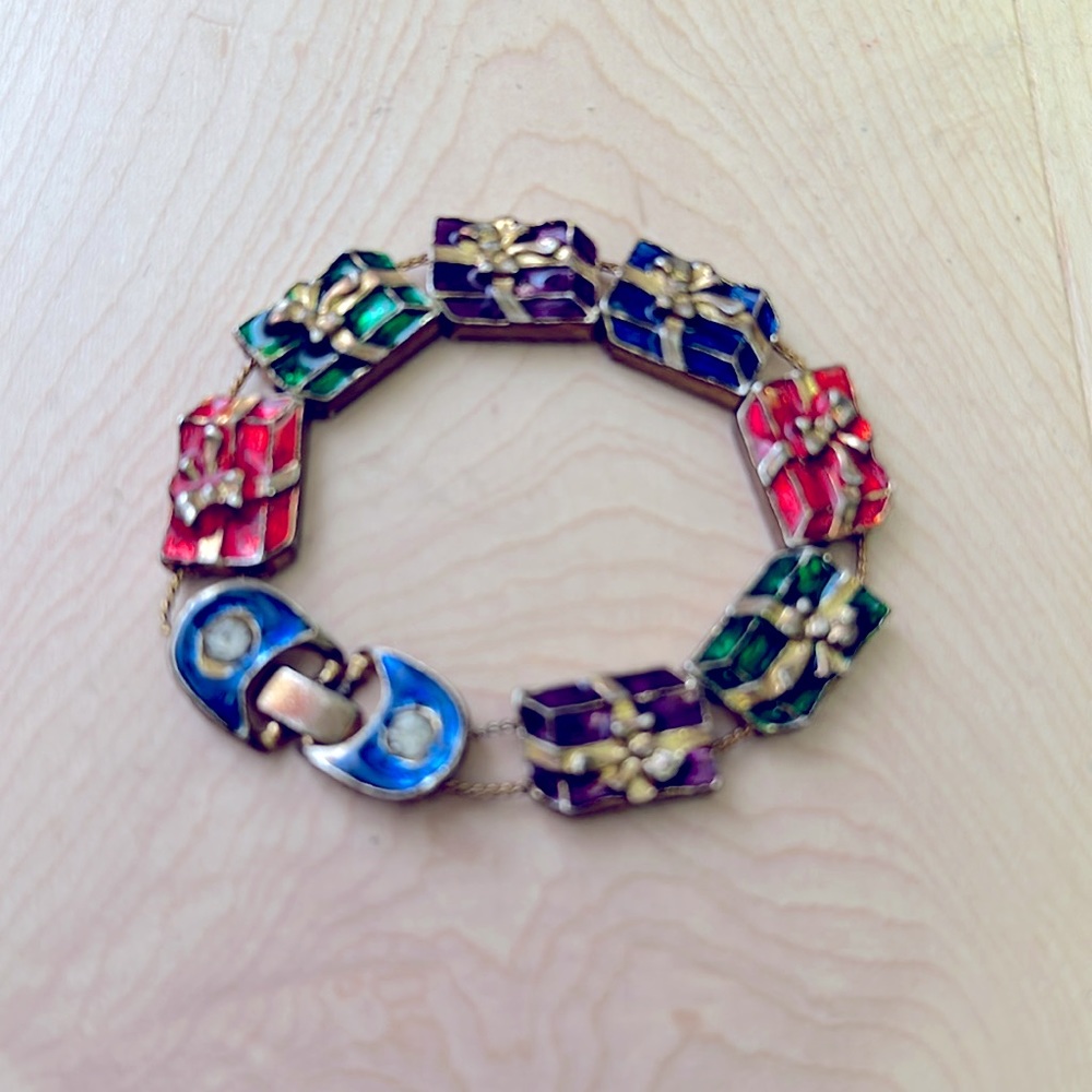 Vintage bracelet with wrapped holiday packages.